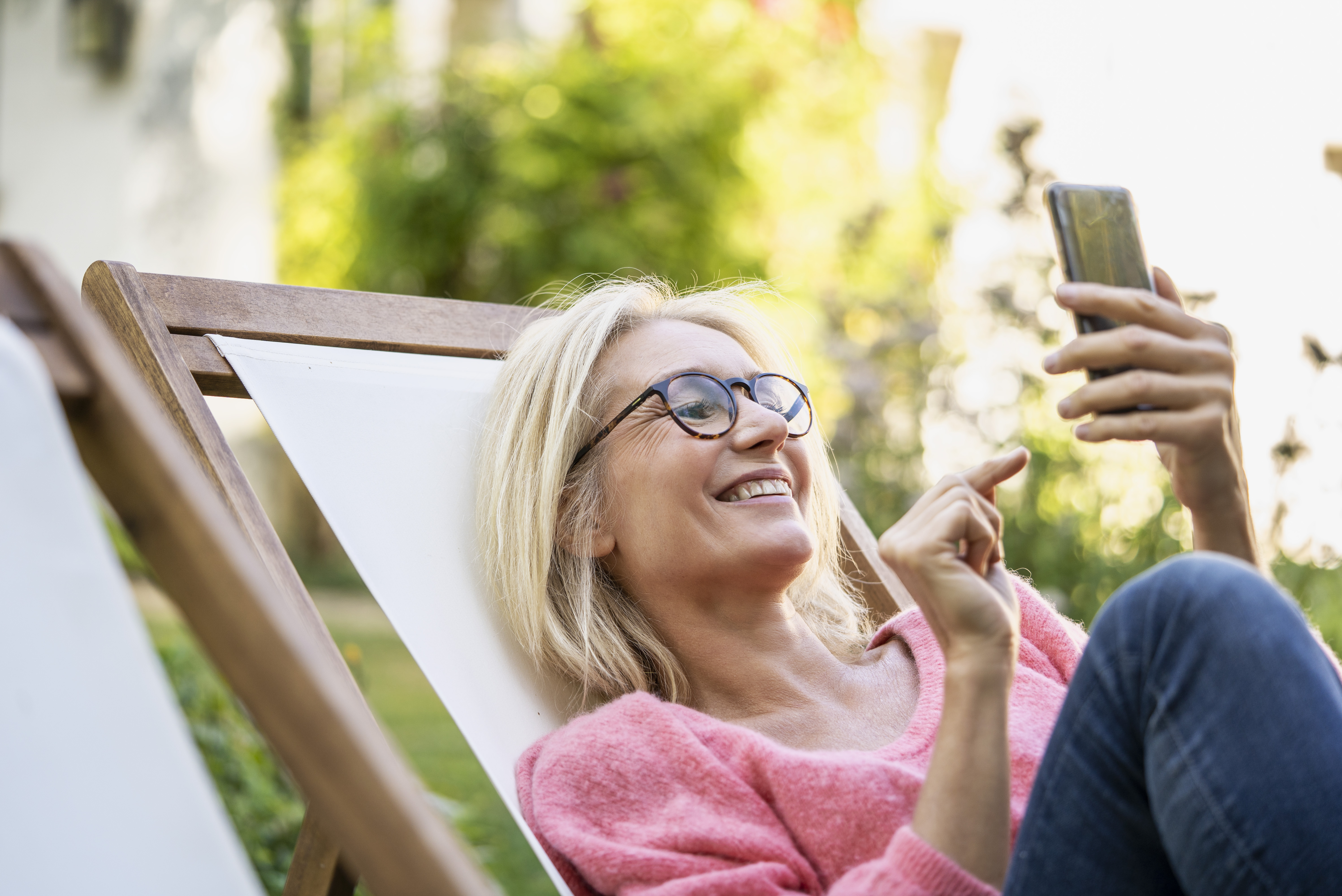 Senior woman engaged in cellphone