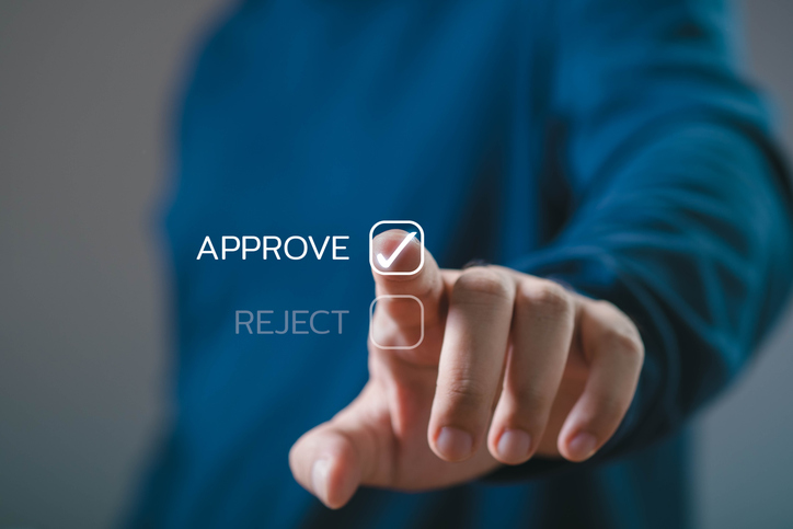 Image of man selected the word "approve"